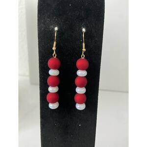 red and opalescent white bead earrings
